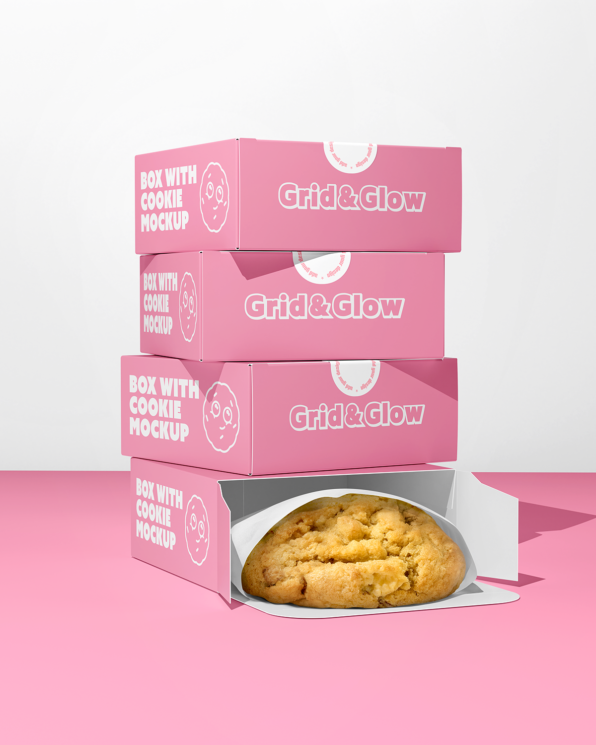 Stack of pink boxes with a cookie mockup on a pink background