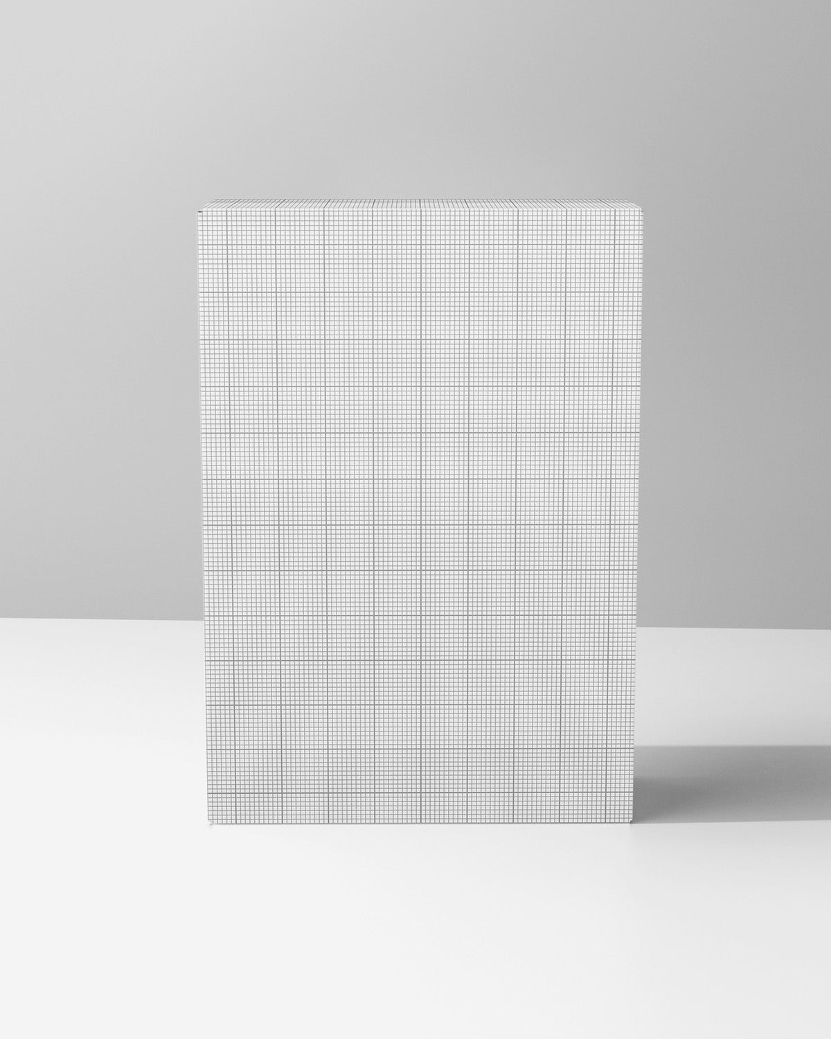box mockup with a grid pattern on a gray background