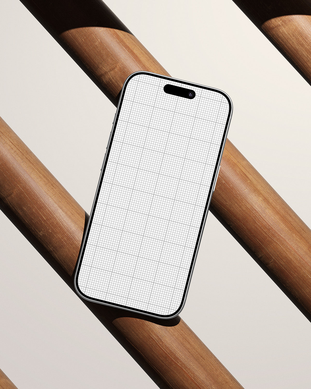 iPhone 17 Pro Mockup grid pattern on screen against a wooden background