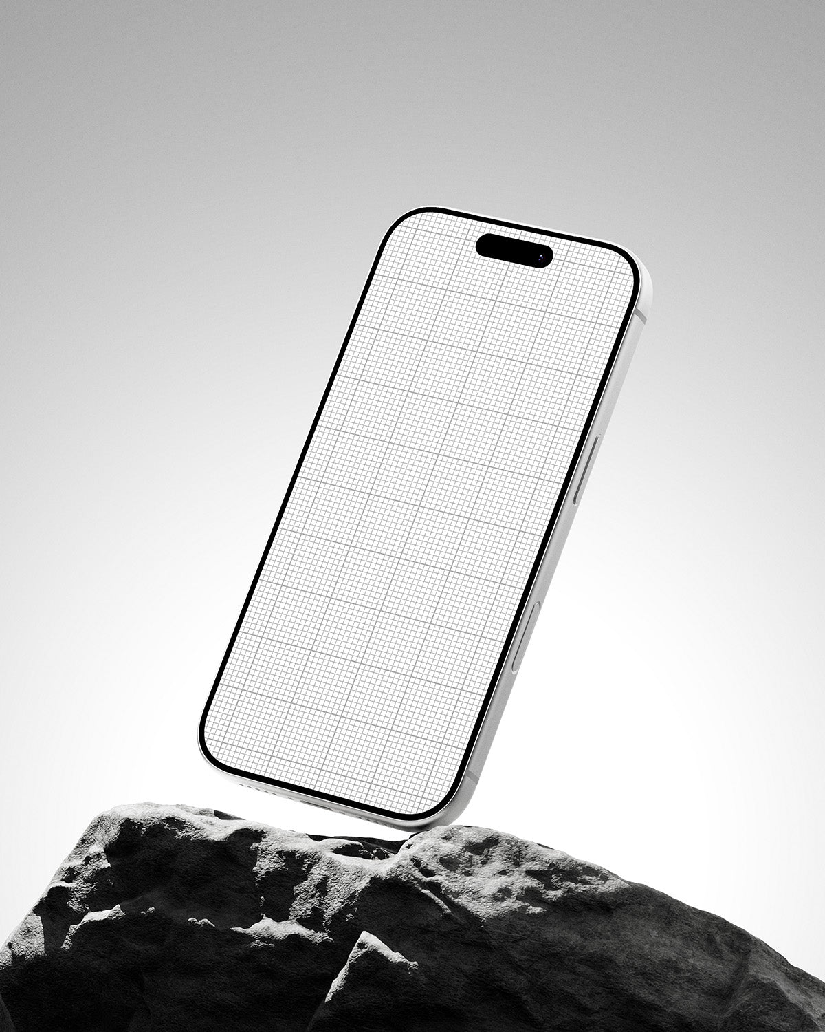 Phone Mockup with grid pattern on screen held above a rock