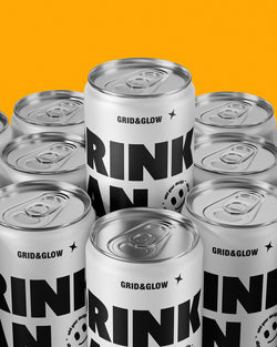 Drink can mockup 12oz 355ml in silver with stacked arrangement on orange background