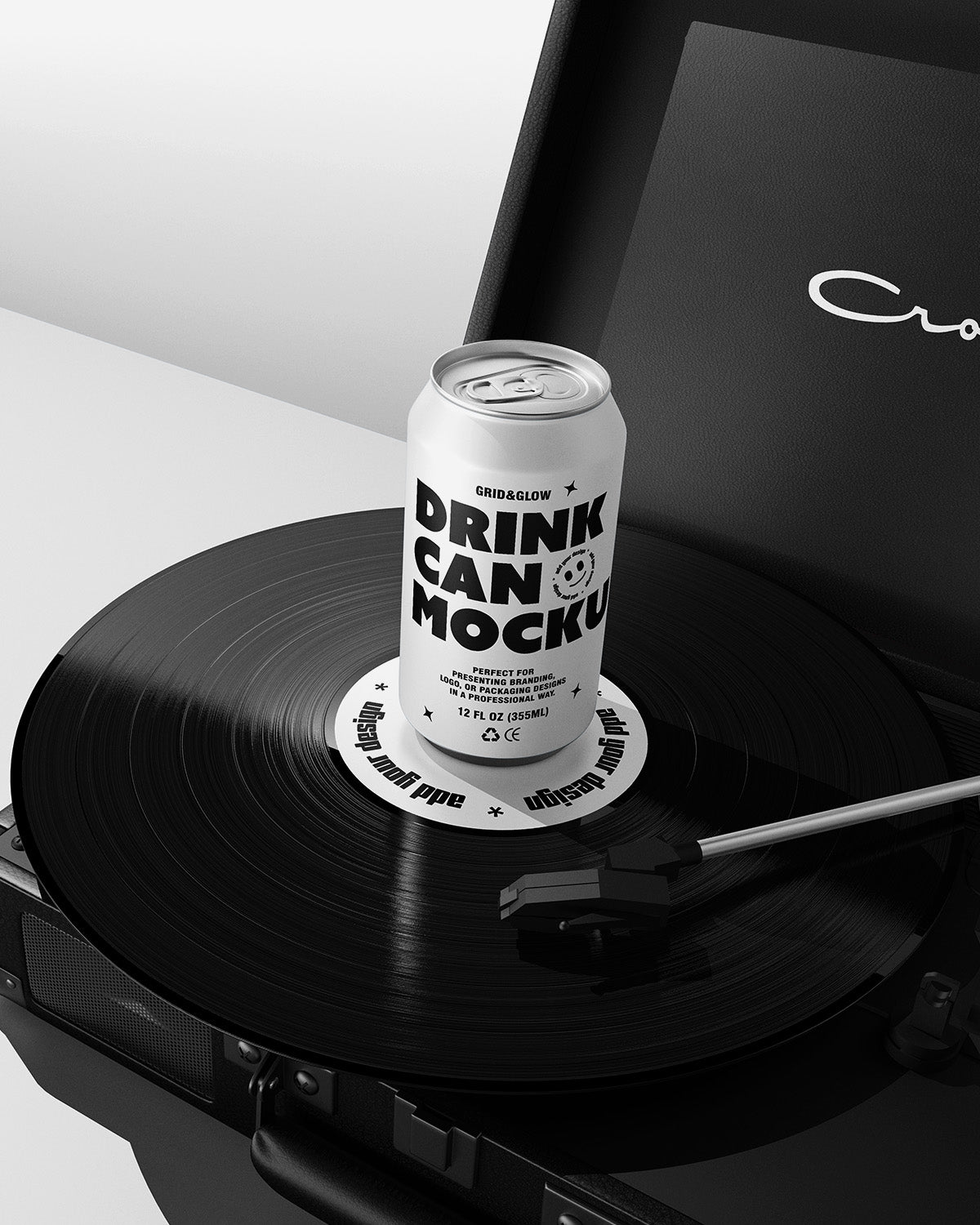 White can with 'Drink Can Mockup' text on a vinyl record inside a record player.