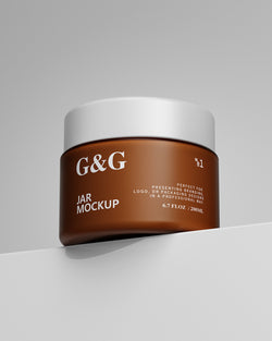Brown jar with white lid labeled 'G&G' on a gray background Mockup