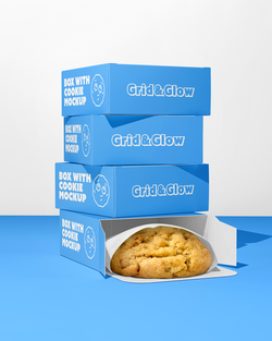 Stack of blue 'Grid & Glow' boxes with a cookie mockup on a white background