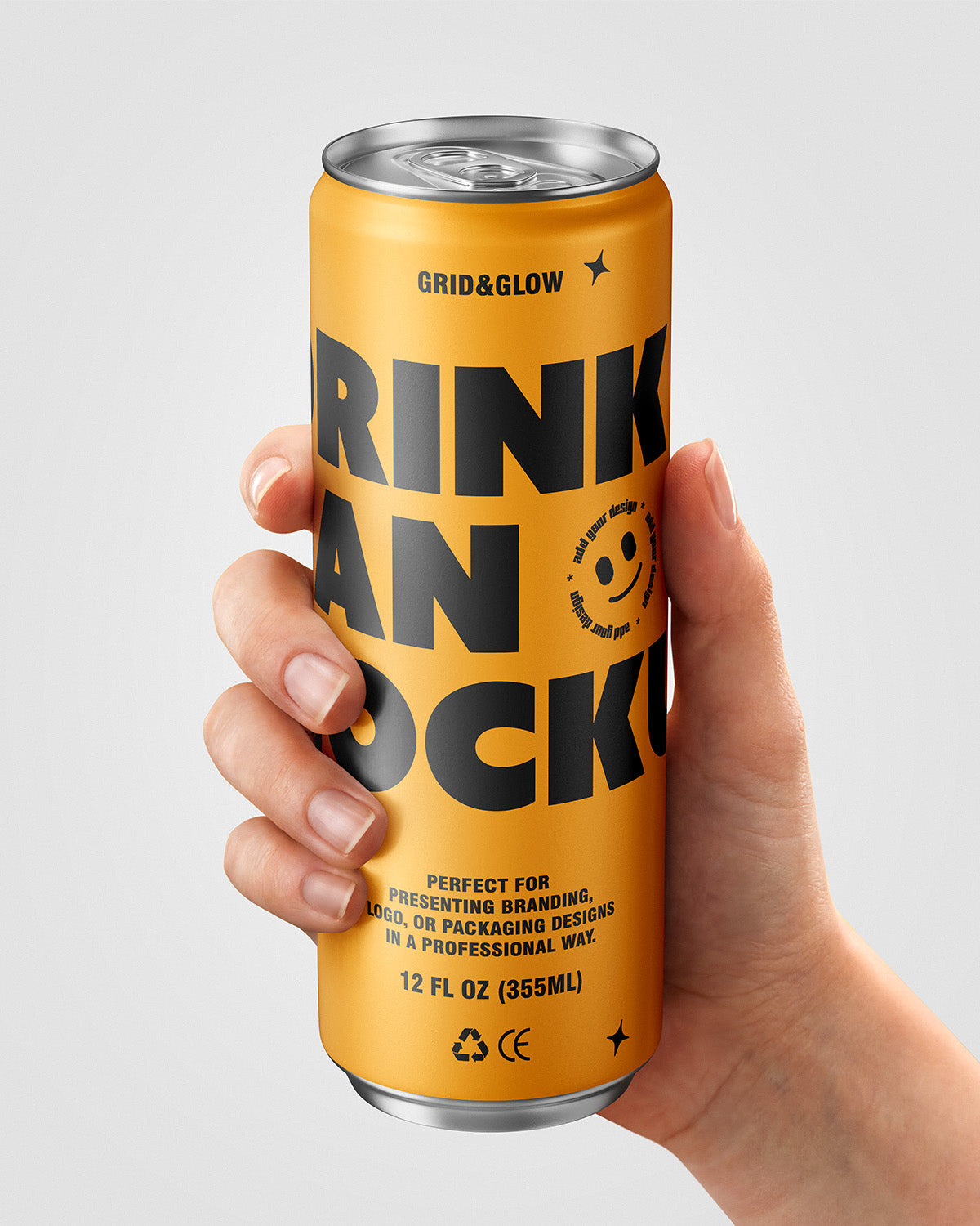 Drink can mockup 12oz 355ml in gold held in hand on gray background