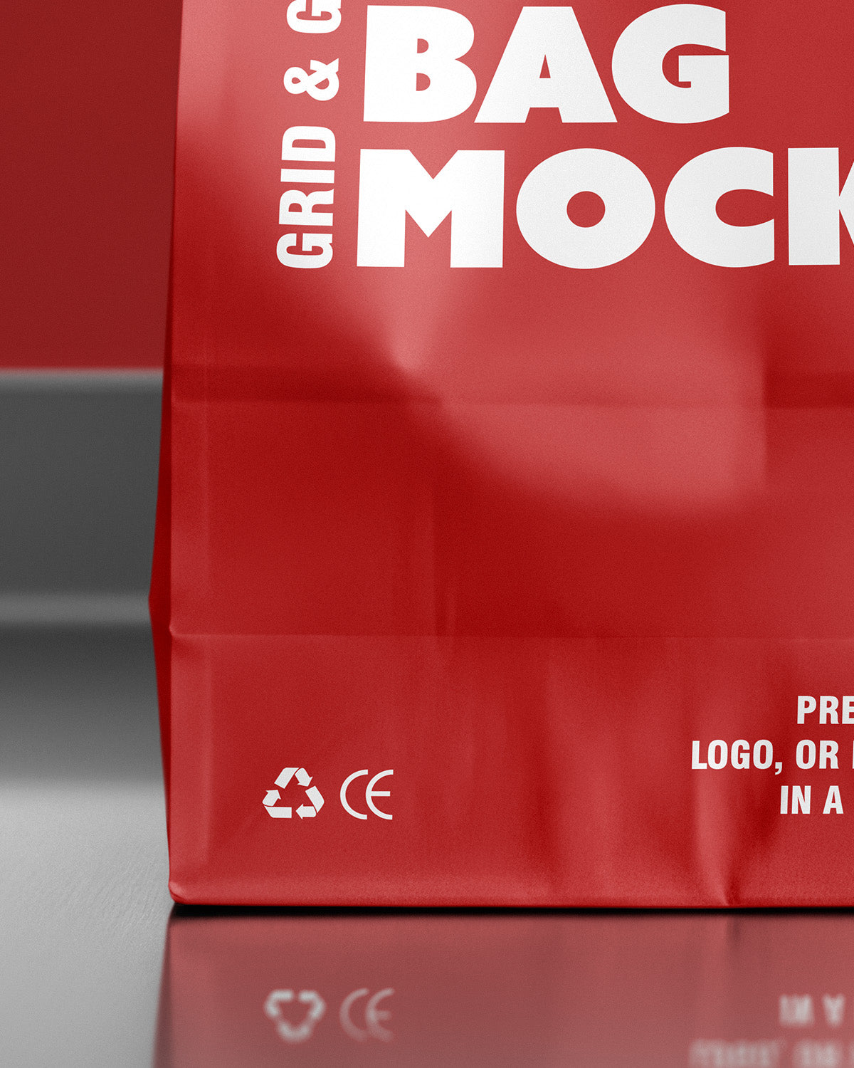 Paper bag mockup in red with front view and glossy surface reflection Macro
