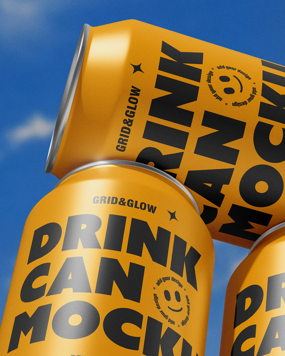 Three yellow cans labeled 'Drink Can Mockup' with a blue sky background