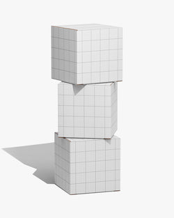 Paper box mockup with three stacked boxes in white and blue on blue background Grid