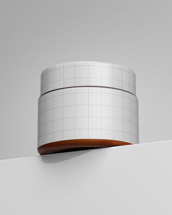 Round wall sconce with grid pattern on a gray background Mockup