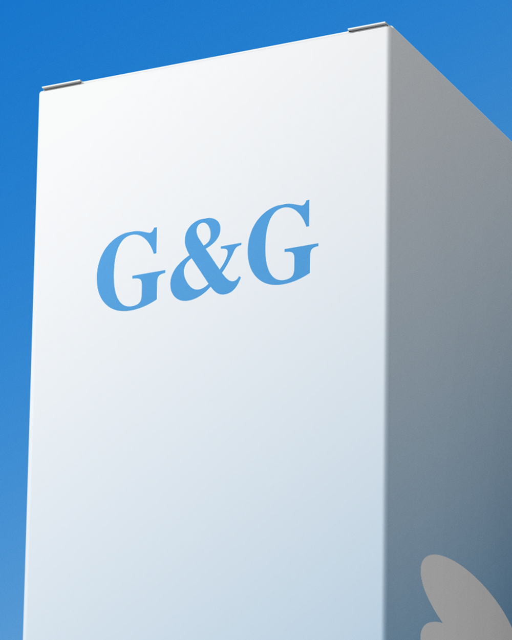 White box with 'G&G' branding against a blue sky