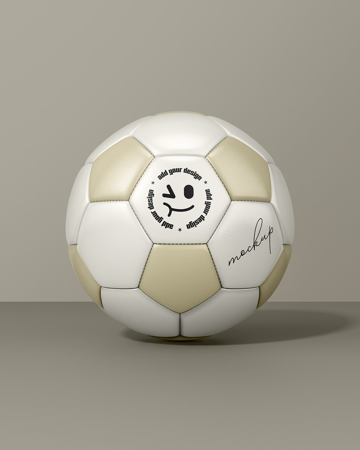 Soccer ball mockup with gold and white panels in front view on beige background