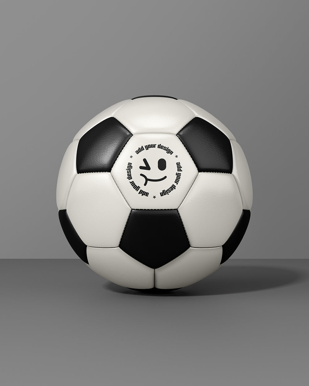 Soccer ball mockup with black and white panels in front view on gray background