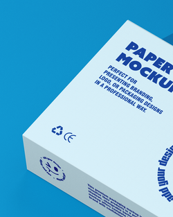 Paper box mockup high angle view with custom branding on blue background macro