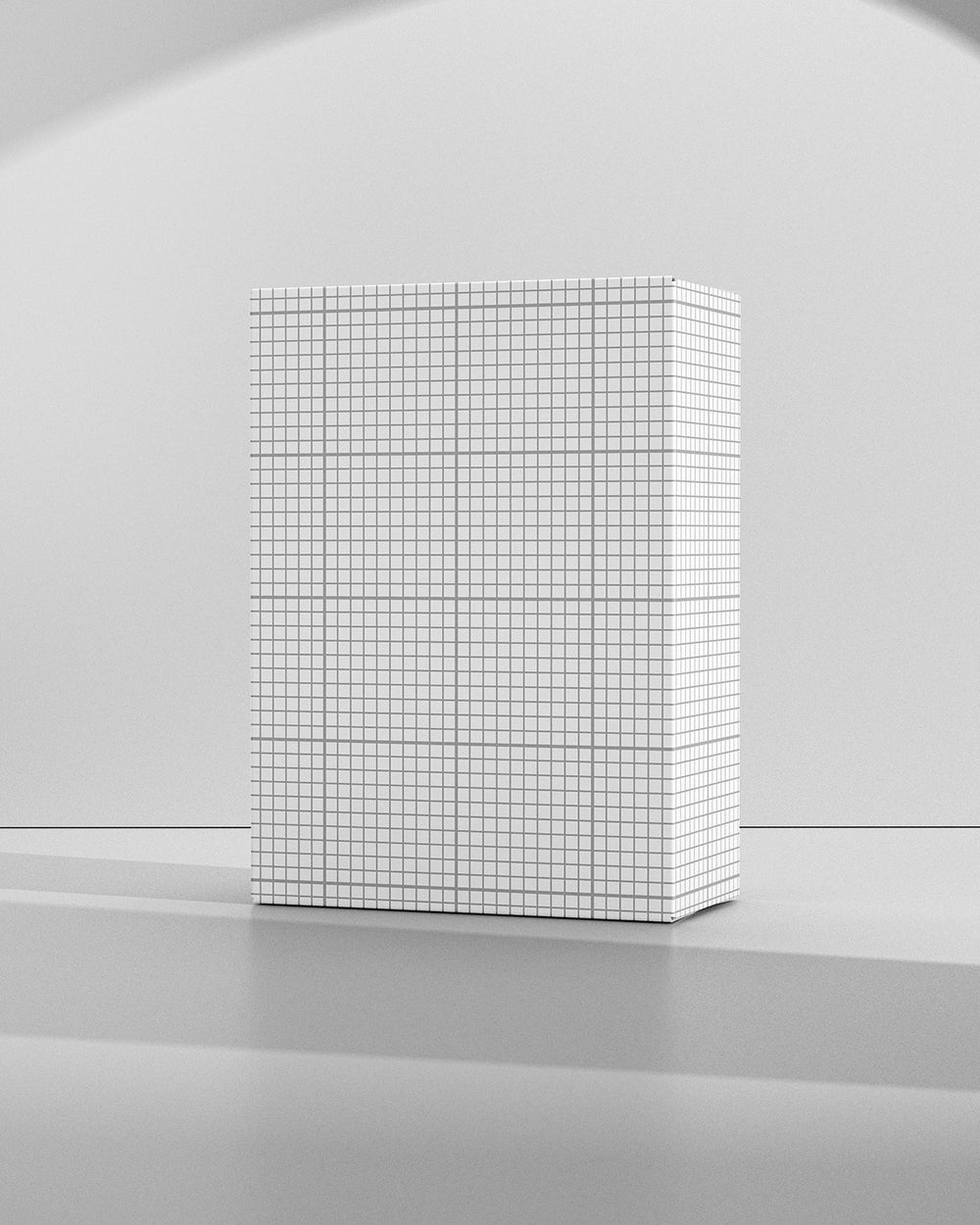 Box mockup with grid pattern on a gray surface